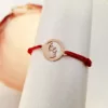 Bratara simbol - Banut 12 mm cu semiluna si stelute - Aur Roz 14 K - Snur reglabil-Bratari Aur Femei-Personalizate >> Ocazie >> Bijuterii tematice pasiuni