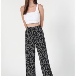 Pantaloni cu talie inalta si imprimeu floral-FEMEI-IMBRACAMINTE/Pantaloni si colanti