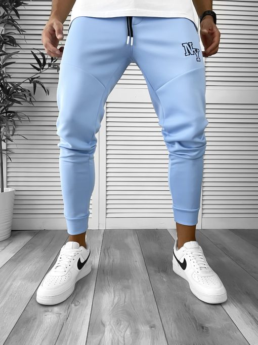 Pantaloni de trening bleu conici 12347-Pantaloni > Pantaloni de trening