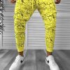 Pantaloni de trening conici galbeni K415  91-3.1-Pantaloni > Pantaloni de trening
