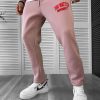 Pantaloni de trening roz conici k170 O2-5.2-Pantaloni > Pantaloni de trening