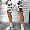 Blugi barbati scurti conici albi  cu stikere  4064 D2-2.3-Blugi barbati > Blugi scurti