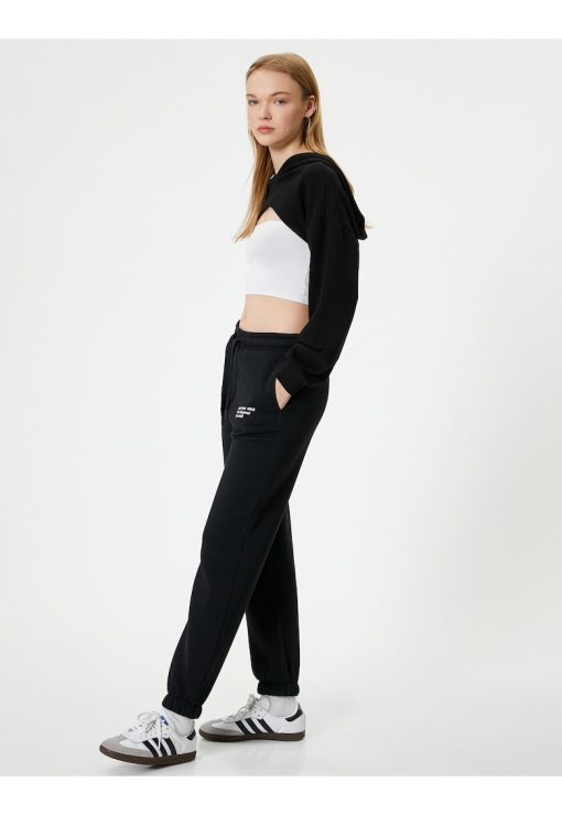Pantaloni de trening din amestec de bumbac cu model text-FEMEI/IMBRACAMINTE/Pantaloni si colanti-IMBRACAMINTE/Pantaloni si colanti