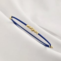 Brățară cu Șnur albastru Gros - 4 Biluțe de 3 mm si 1 biluta de 4 mm - Argint 925 Placat cu Aur Galben 18K-Toate >> Argint 925 >> Bratari Argint >> Noutati