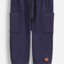 Coccodrillo pantaloni de trening din bumbac pentru bebeluși culoarea bleumarin