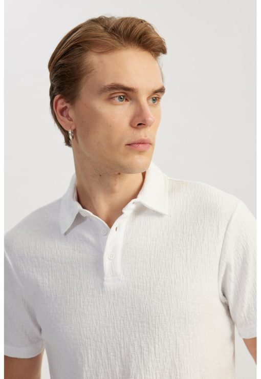 Tricou polo cu model texturat-BARBATI/IMBRACAMINTE/Tricouri si maiouri-IMBRACAMINTE/Tricouri si maiouri