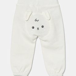 United Colors of Benetton pantaloni de trening din bumbac pentru bebeluși culoarea bej