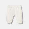United Colors of Benetton pantaloni de trening pentru bebeluși culoarea bej