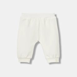 United Colors of Benetton pantaloni de trening pentru bebeluși culoarea bej