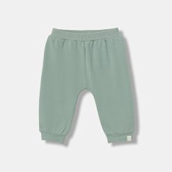 United Colors of Benetton pantaloni de trening pentru bebeluși culoarea turcoaz